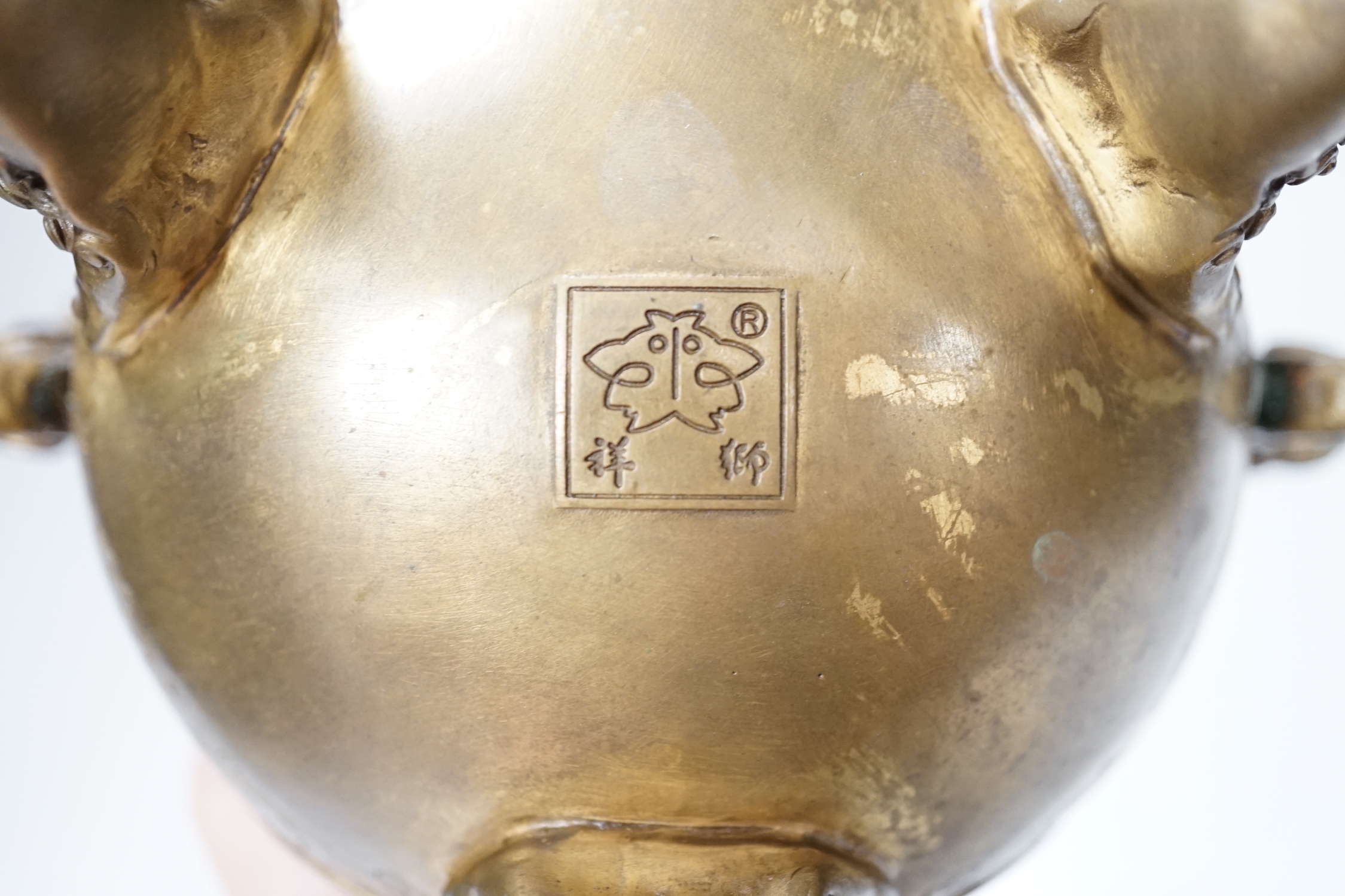 A Japanese bronze shi-shi footed censer and cover, 22cm high